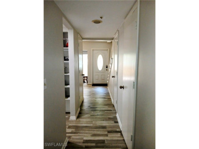 This beautifully designed townhouse, located in a vibrant 55+ on Lehigh Resort Club in Florida - for sale on GolfHomes.com, golf home, golf lot