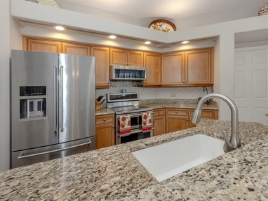 Discover the unparalleled lifestyle of the private, member-owned on The Venice Golf and Country Club in Florida - for sale on GolfHomes.com, golf home, golf lot