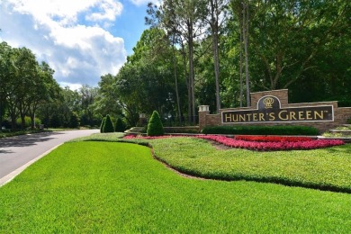 Exceptional home located on the 14th green of the Fazio designed on Hunters Green Country Club in Florida - for sale on GolfHomes.com, golf home, golf lot