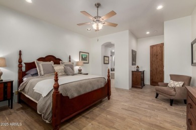 This stunning model home in the exclusive Superstition Golf & on Superstition Mountain Club - Lost Gold in Arizona - for sale on GolfHomes.com, golf home, golf lot