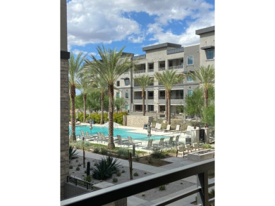 Lock and leave lifestyle. Pool View from oversized balcony on Wildfire Golf Club in Arizona - for sale on GolfHomes.com, golf home, golf lot