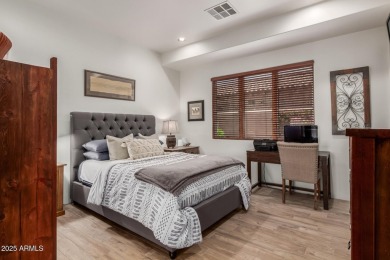 This stunning model home in the exclusive Superstition Golf & on Superstition Mountain Club - Lost Gold in Arizona - for sale on GolfHomes.com, golf home, golf lot