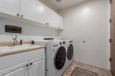 This stunning model home in the exclusive Superstition Golf & on Superstition Mountain Club - Lost Gold in Arizona - for sale on GolfHomes.com, golf home, golf lot