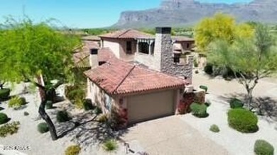 This stunning model home in the exclusive Superstition Golf & on Superstition Mountain Club - Lost Gold in Arizona - for sale on GolfHomes.com, golf home, golf lot