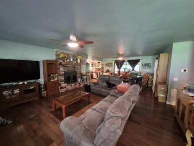 Stunning 4-bedroom home with a bonus room to make it 5 bedrooms! on Bella Vista Country Club and Golf Course in Arkansas - for sale on GolfHomes.com, golf home, golf lot
