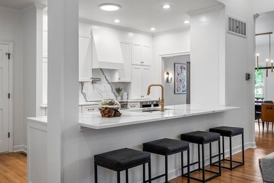 Beautifully renovated and thoughtfully designed, this 4-bedroom on Woodside Plantation Country Club in South Carolina - for sale on GolfHomes.com, golf home, golf lot