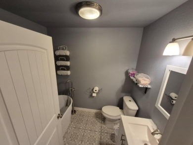 Stunning 4-bedroom home with a bonus room to make it 5 bedrooms! on Bella Vista Country Club and Golf Course in Arkansas - for sale on GolfHomes.com, golf home, golf lot