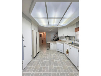 Step into this large 2-bedroom, 2-bathroom home in the premier on Fairway Village Golf Course in Florida - for sale on GolfHomes.com, golf home, golf lot