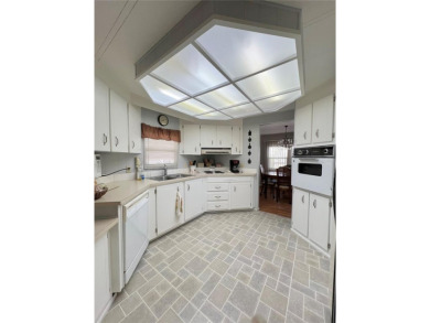 Step into this large 2-bedroom, 2-bathroom home in the premier on Fairway Village Golf Course in Florida - for sale on GolfHomes.com, golf home, golf lot
