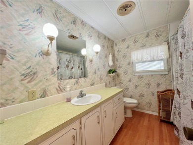 Step into this large 2-bedroom, 2-bathroom home in the premier on Fairway Village Golf Course in Florida - for sale on GolfHomes.com, golf home, golf lot