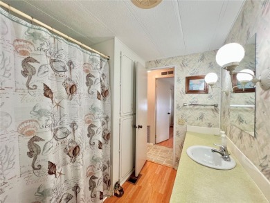 Step into this large 2-bedroom, 2-bathroom home in the premier on Fairway Village Golf Course in Florida - for sale on GolfHomes.com, golf home, golf lot