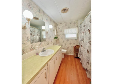 Step into this large 2-bedroom, 2-bathroom home in the premier on Fairway Village Golf Course in Florida - for sale on GolfHomes.com, golf home, golf lot