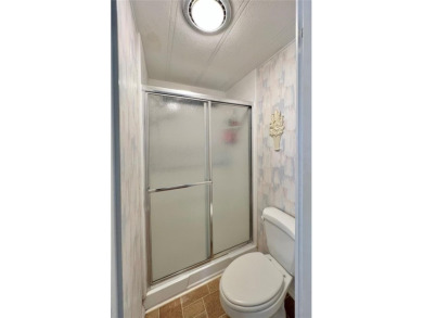 Step into this large 2-bedroom, 2-bathroom home in the premier on Fairway Village Golf Course in Florida - for sale on GolfHomes.com, golf home, golf lot