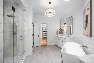 Beautifully renovated and thoughtfully designed, this 4-bedroom on Woodside Plantation Country Club in South Carolina - for sale on GolfHomes.com, golf home, golf lot