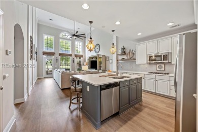 Luxurious townhome with stunning lagoon views overlooking the on Hampton Pointe Golf Course in South Carolina - for sale on GolfHomes.com, golf home, golf lot