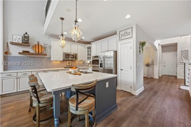 Luxurious townhome with stunning lagoon views overlooking the on Hampton Pointe Golf Course in South Carolina - for sale on GolfHomes.com, golf home, golf lot