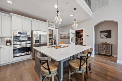 Luxurious townhome with stunning lagoon views overlooking the on Hampton Pointe Golf Course in South Carolina - for sale on GolfHomes.com, golf home, golf lot