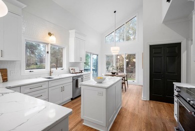 Welcome to this completely updated 4-bedroom, 3-bathroom home in on Woodside Plantation Country Club in South Carolina - for sale on GolfHomes.com, golf home, golf lot