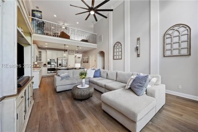 Luxurious townhome with stunning lagoon views overlooking the on Hampton Pointe Golf Course in South Carolina - for sale on GolfHomes.com, golf home, golf lot