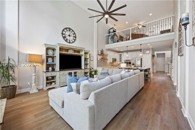 Luxurious townhome with stunning lagoon views overlooking the on Hampton Pointe Golf Course in South Carolina - for sale on GolfHomes.com, golf home, golf lot
