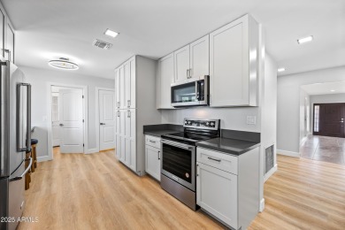 Beautifully Renovated Golf Course Home with Designer Touches on Sun City Lakes West and East in Arizona - for sale on GolfHomes.com, golf home, golf lot