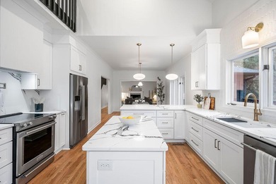 Welcome to this completely updated 4-bedroom, 3-bathroom home in on Woodside Plantation Country Club in South Carolina - for sale on GolfHomes.com, golf home, golf lot