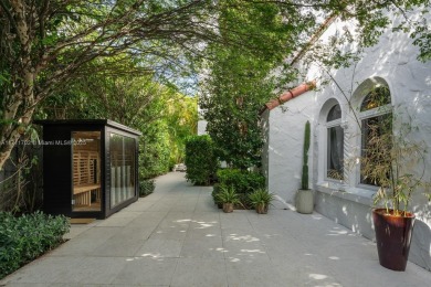 This stunning 6-bedroom Mediterranean-style home offers 3,770 SF on Miami Beach Golf Club in Florida - for sale on GolfHomes.com, golf home, golf lot