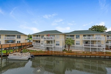 This lovely condo is right on the canal and will be great for on Sandpiper Cove Golf Course in Florida - for sale on GolfHomes.com, golf home, golf lot