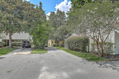 Tucked within the serene enclave of Snee Farm Gardens on the on Snee Farm Country Club in South Carolina - for sale on GolfHomes.com, golf home, golf lot