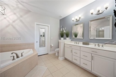 Luxurious townhome with stunning lagoon views overlooking the on Hampton Pointe Golf Course in South Carolina - for sale on GolfHomes.com, golf home, golf lot