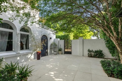 This stunning 6-bedroom Mediterranean-style home offers 3,770 SF on Miami Beach Golf Club in Florida - for sale on GolfHomes.com, golf home, golf lot