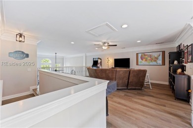 Luxurious townhome with stunning lagoon views overlooking the on Hampton Pointe Golf Course in South Carolina - for sale on GolfHomes.com, golf home, golf lot