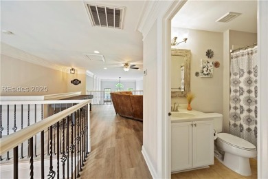 Luxurious townhome with stunning lagoon views overlooking the on Hampton Pointe Golf Course in South Carolina - for sale on GolfHomes.com, golf home, golf lot