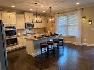 Elegant 3-Story Home with Finished Walk-Out Basement in the on Bartram Trail Golf Club in Georgia - for sale on GolfHomes.com, golf home, golf lot