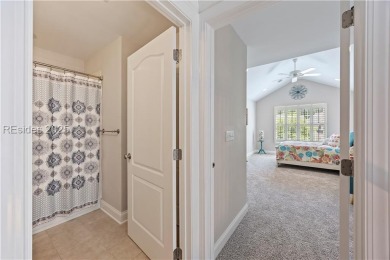 Luxurious townhome with stunning lagoon views overlooking the on Hampton Pointe Golf Course in South Carolina - for sale on GolfHomes.com, golf home, golf lot