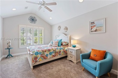 Luxurious townhome with stunning lagoon views overlooking the on Hampton Pointe Golf Course in South Carolina - for sale on GolfHomes.com, golf home, golf lot