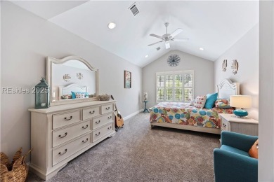 Luxurious townhome with stunning lagoon views overlooking the on Hampton Pointe Golf Course in South Carolina - for sale on GolfHomes.com, golf home, golf lot