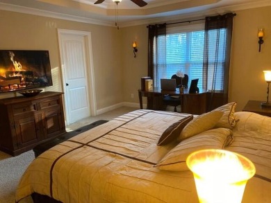 Elegant 3-Story Home with Finished Walk-Out Basement in the on Bartram Trail Golf Club in Georgia - for sale on GolfHomes.com, golf home, golf lot