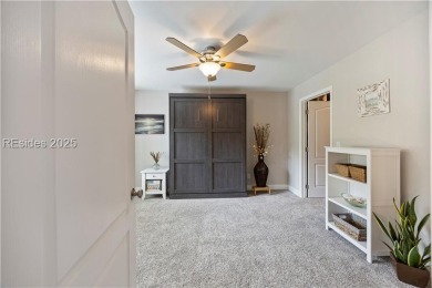 Luxurious townhome with stunning lagoon views overlooking the on Hampton Pointe Golf Course in South Carolina - for sale on GolfHomes.com, golf home, golf lot