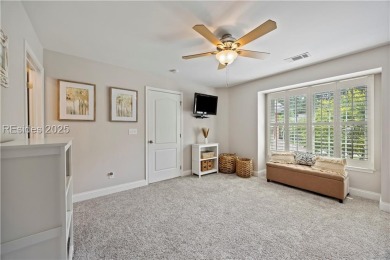 Luxurious townhome with stunning lagoon views overlooking the on Hampton Pointe Golf Course in South Carolina - for sale on GolfHomes.com, golf home, golf lot