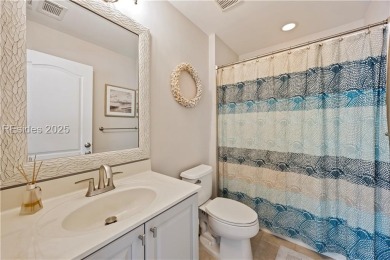 Luxurious townhome with stunning lagoon views overlooking the on Hampton Pointe Golf Course in South Carolina - for sale on GolfHomes.com, golf home, golf lot