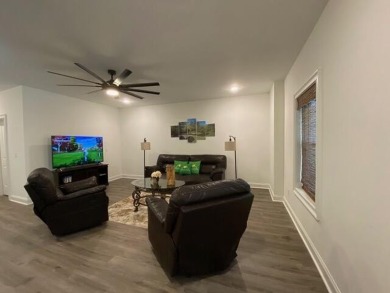 Elegant 3-Story Home with Finished Walk-Out Basement in the on Bartram Trail Golf Club in Georgia - for sale on GolfHomes.com, golf home, golf lot
