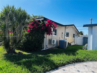 Modern Luxe Sanctuary in Sunrise. Step into your private oasis on Sunrise Lakes Phase III in Florida - for sale on GolfHomes.com, golf home, golf lot