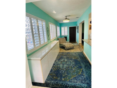 Modern Luxe Sanctuary in Sunrise. Step into your private oasis on Sunrise Lakes Phase III in Florida - for sale on GolfHomes.com, golf home, golf lot