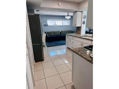 Modern Luxe Sanctuary in Sunrise. Step into your private oasis on Sunrise Lakes Phase III in Florida - for sale on GolfHomes.com, golf home, golf lot