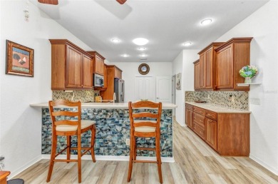 One or more photo(s) has been virtually staged. One of the on Kings Gate Golf Club in Florida - for sale on GolfHomes.com, golf home, golf lot