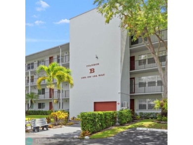 Paradise awaits! Bright and beautiful first floor unit with on Flamingo Lakes Country Club in Florida - for sale on GolfHomes.com, golf home, golf lot