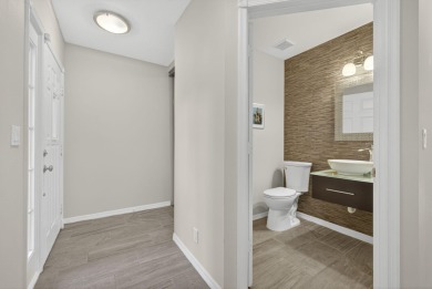 Vacant and move-in ready! This beautifully maintained Golf on BallenIsles Golf and Country Club in Florida - for sale on GolfHomes.com, golf home, golf lot