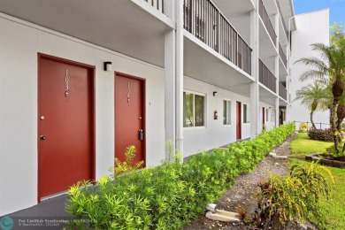 Paradise awaits! Bright and beautiful first floor unit with on Flamingo Lakes Country Club in Florida - for sale on GolfHomes.com, golf home, golf lot