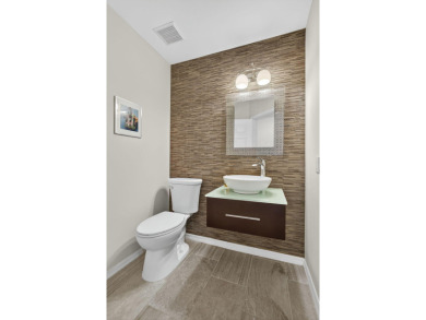 Vacant and move-in ready! This beautifully maintained Golf on BallenIsles Golf and Country Club in Florida - for sale on GolfHomes.com, golf home, golf lot